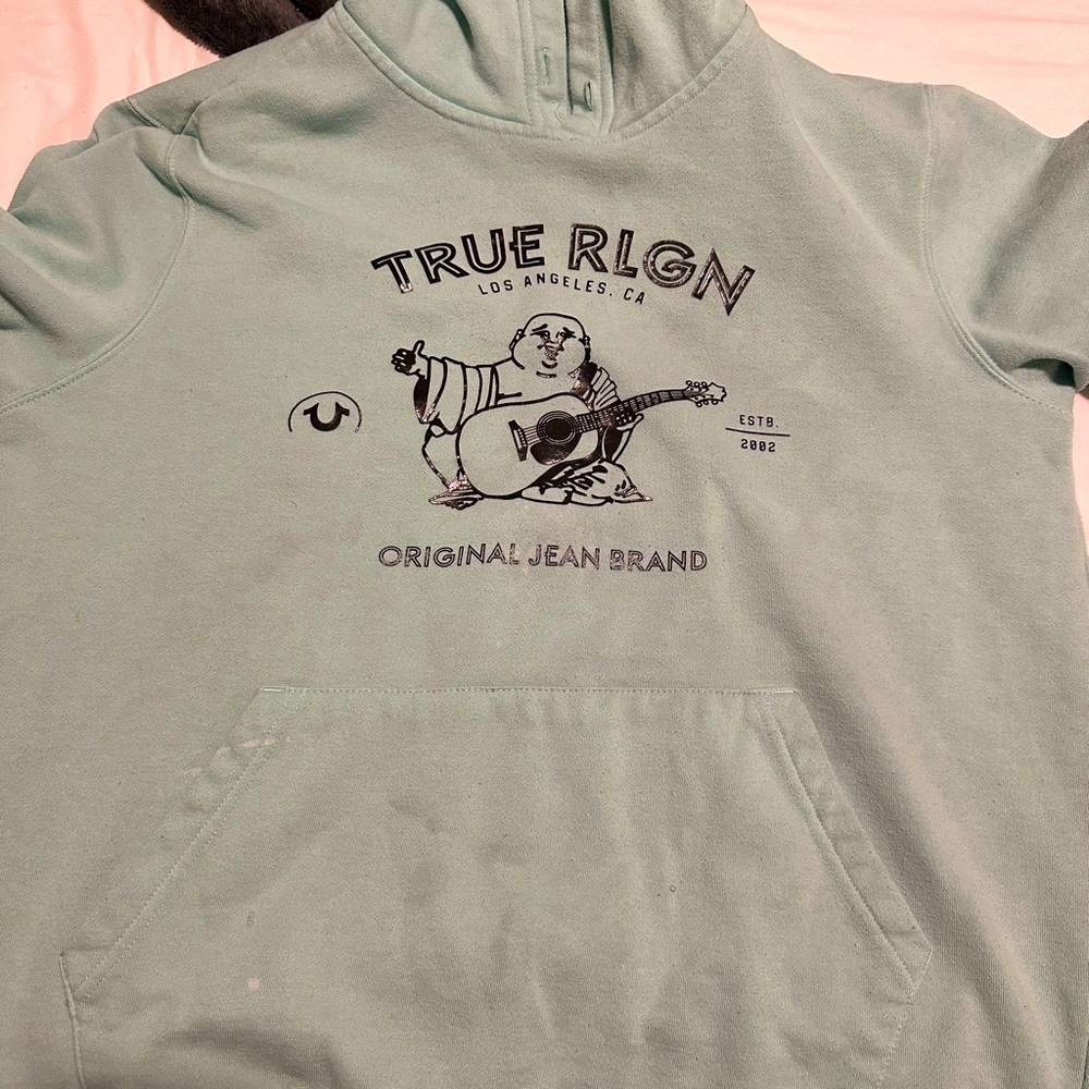 Turquoise true religion hoodie size large. Few stains as seen in pic.